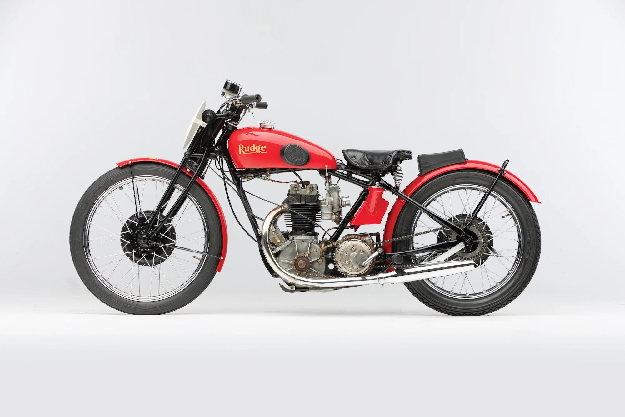Red motorcycle on a white background